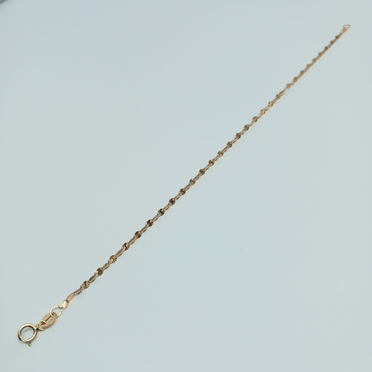 Dámský náramek ze žlutého zlata 14k . 0,70g . 18cm . stav B
