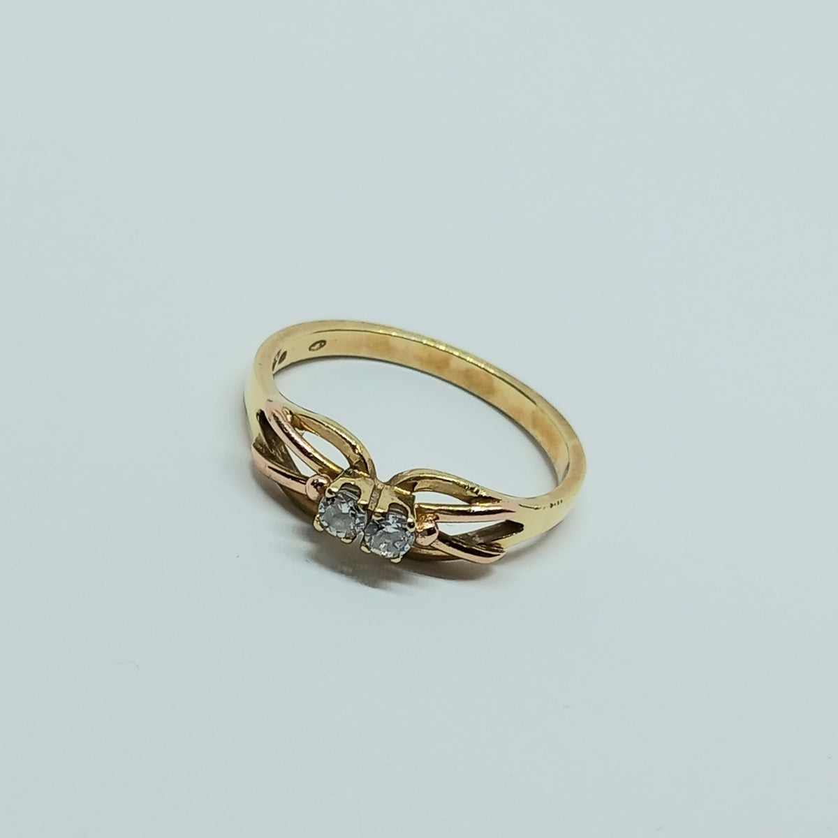 Dámský prsten ze žlutého a růžového zlata 14k . 2,82g . vel. 58 . stav B