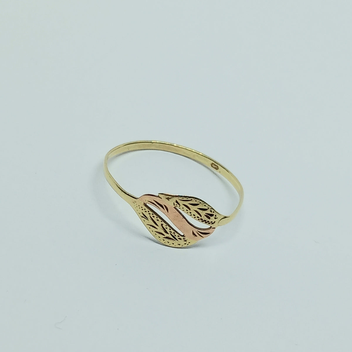 Dámský prsten ze žlutého a růžového zlata 14k . 0,69g . vel. 57 . stav B