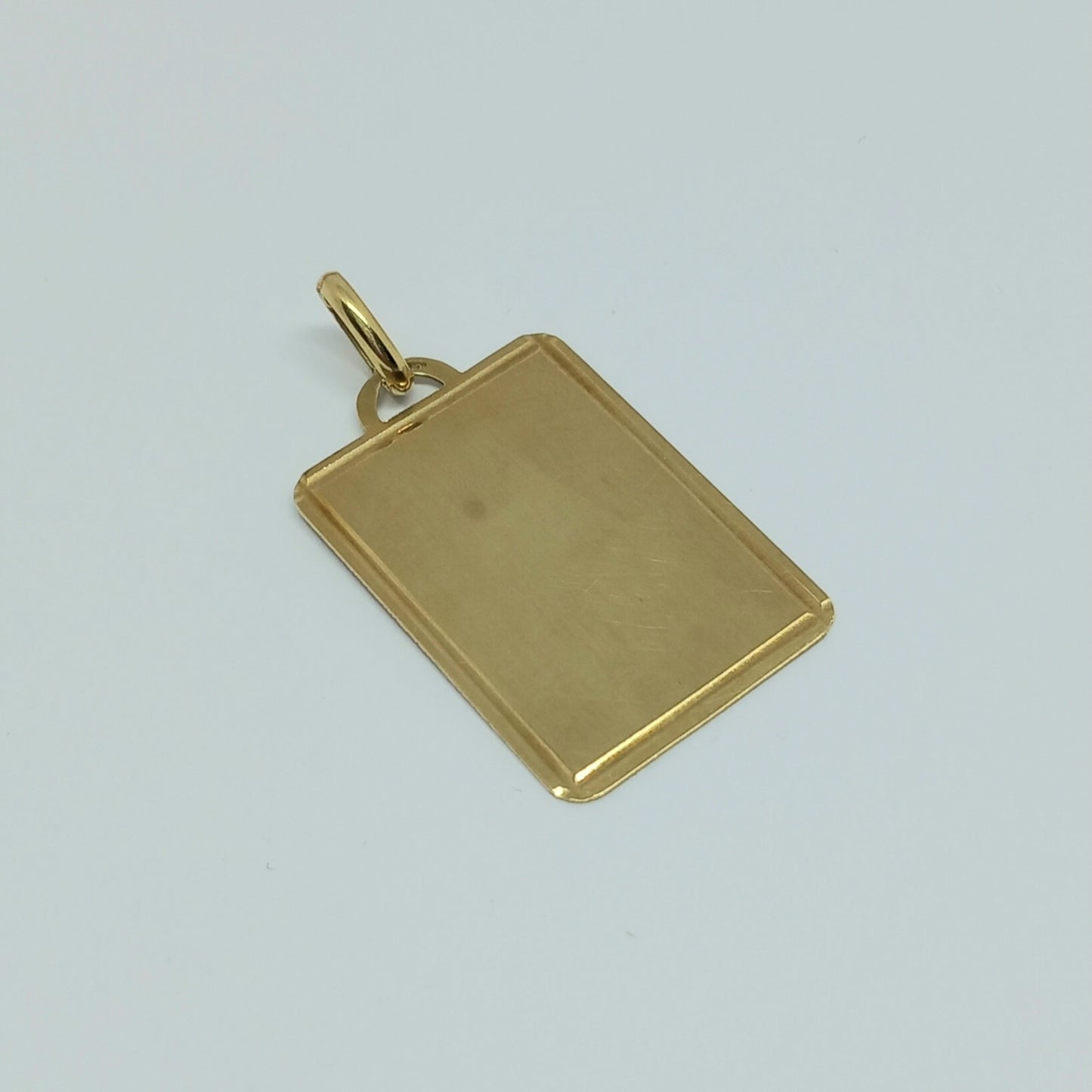 Zlatý přívěšek Placka