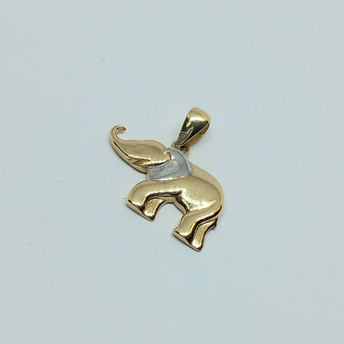 Přívěšek ze žlutého a bílého zlata 14k . Slon . 1,29g . stav A1