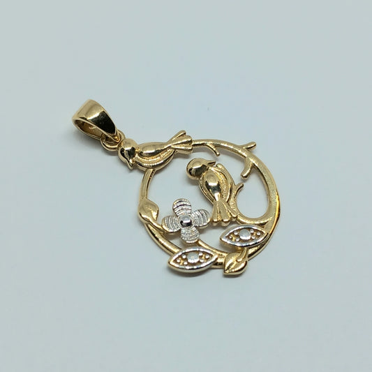 Přívěšek ze žlutého a bílého zlata 14k . Ptáček . 1,50g . stav A1
