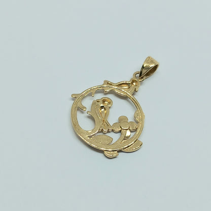 Přívěšek ze žlutého a bílého zlata 14k . Ptáček . 1,50g . stav A1