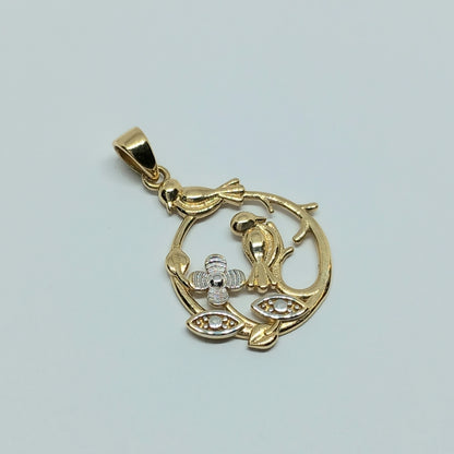 Přívěšek ze žlutého a bílého zlata 14k . Ptáček . 1,50g . stav A1