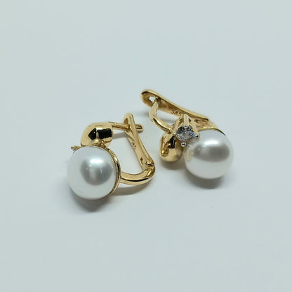 Náušnice ze žlutého zlata 14k . Visací . Perla . 4,73g . stav A1