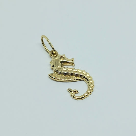 Přívěšek ze žlutého zlata 14k . Mořský koník . 1,06g . stav A