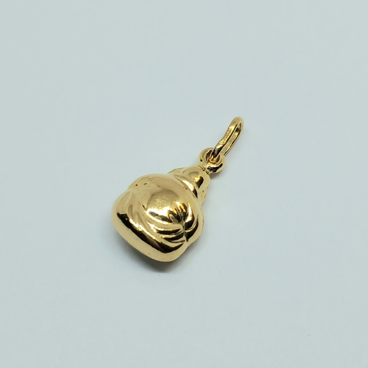 Přívěšek ze žlutého zlata 14k . 1,20g . Budha . stav A