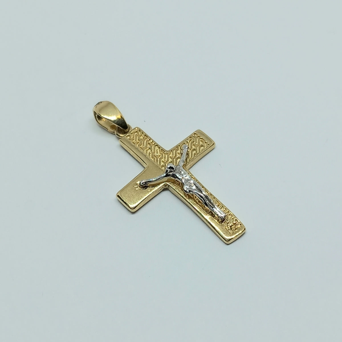 Přívěšek ze žlutého a bílého zlata 14k . Kříž . 1,38g . stav A1