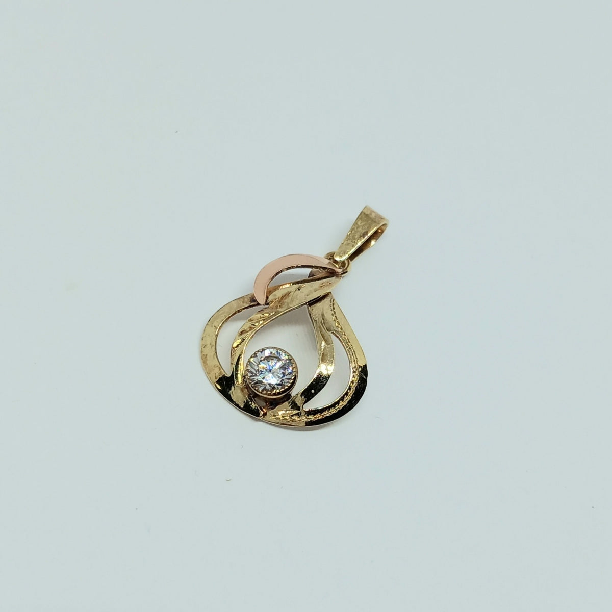 Přívěšek ze žlutého a růžového zlata 14k . 1,20g . stav B