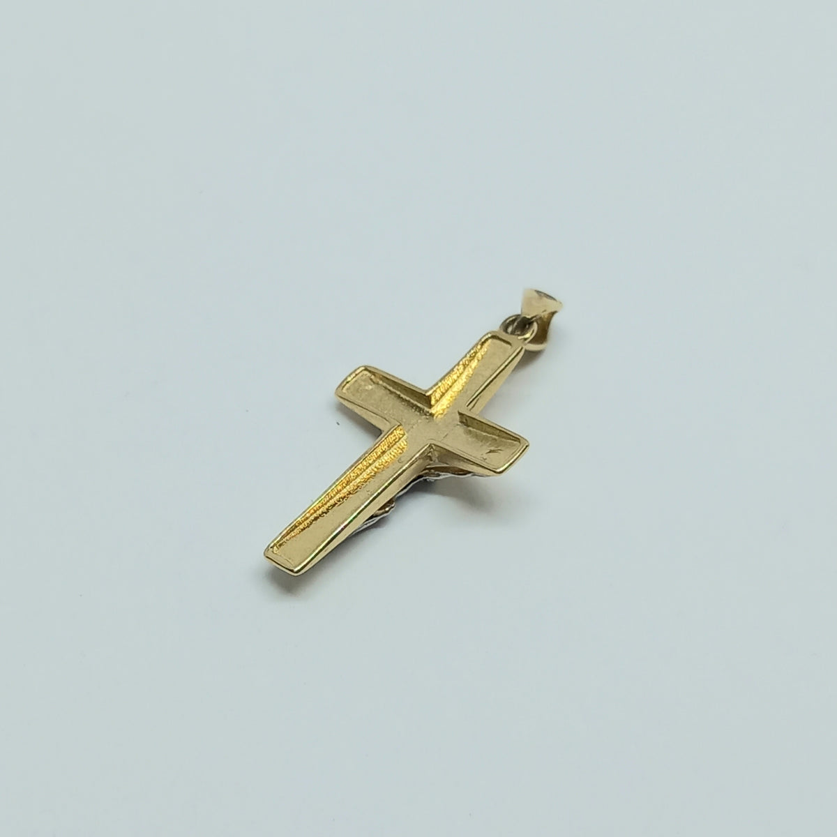 Přívěšek ze žlutého a bílého zlata 14k . Kříž . 0,89g . stav A1