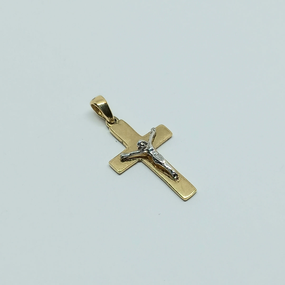 Přívěšek ze žlutého a bílého zlata 14k . Kříž . 0,82g . stav A1