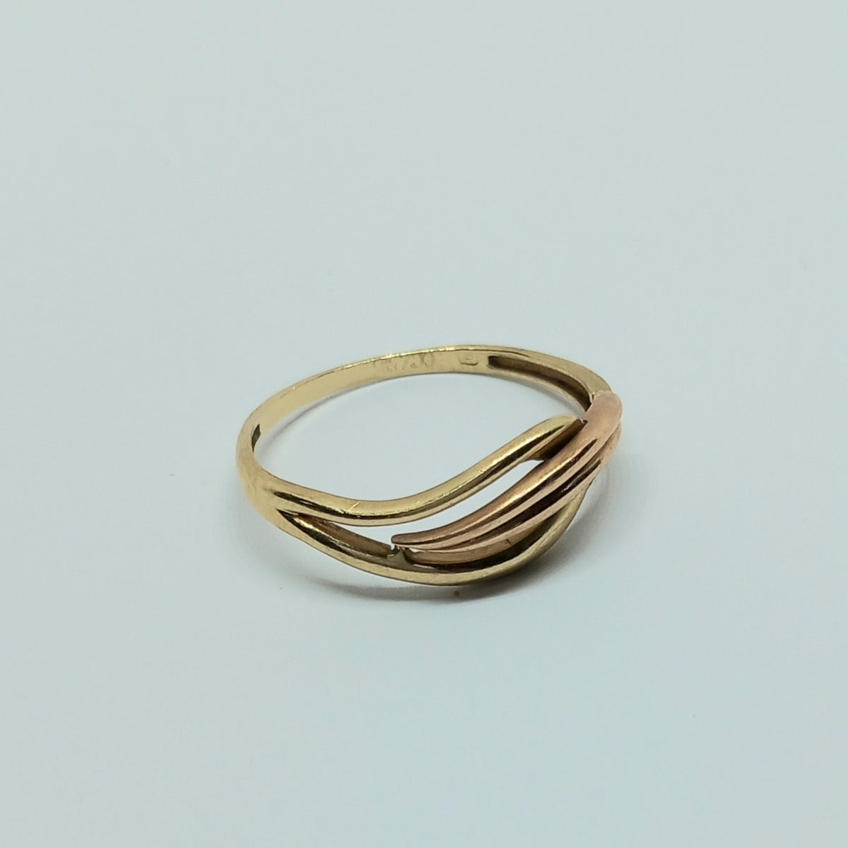 Dámský prsten ze žlutého a růžového zlata 14k . vel. 62 . 2,15g . stav. B