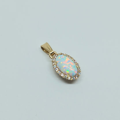 Přívěšek ze žlutého zlata 14k . Opál . 1,49g . stav A